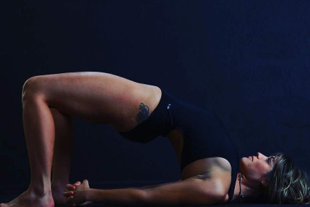 Jenna Lomazzo in bridge pose in Florida