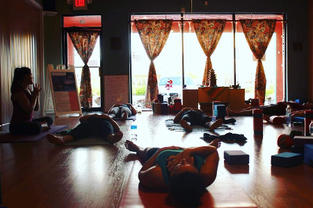 Jenna Lomazzo leading savasana at Thee House of Yoga